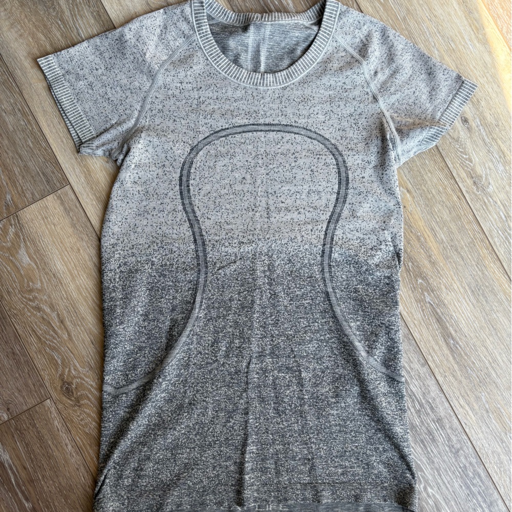 Swiftly t-shirt from Lululemon. Size 8